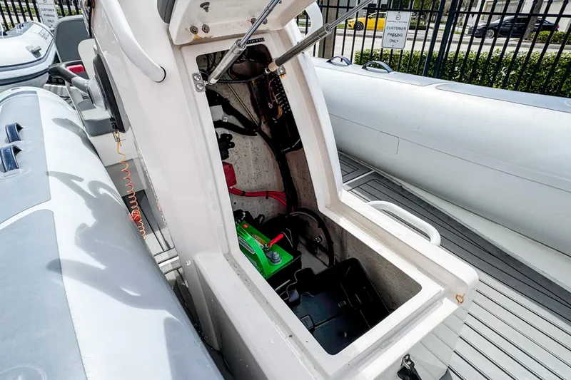 Slide: The Image of Open storage compartment of 2024 Highfield Classic 420 boat, showcasing interior details. - 10