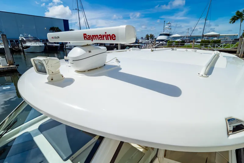 Slide: The Image of 2019 Boston Whaler 350 Realm with Raymarine radar at marina. - 107