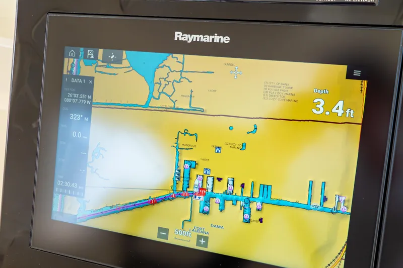 Slide: The Image of Raymarine navigation display on 2019 Boston Whaler 350 Realm, showing depth and map details. - 16