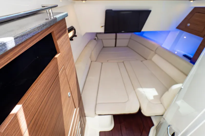 Slide: The Image of Luxurious interior cabin of 2019 Boston Whaler 350 Realm with plush seating and modern design. - 42