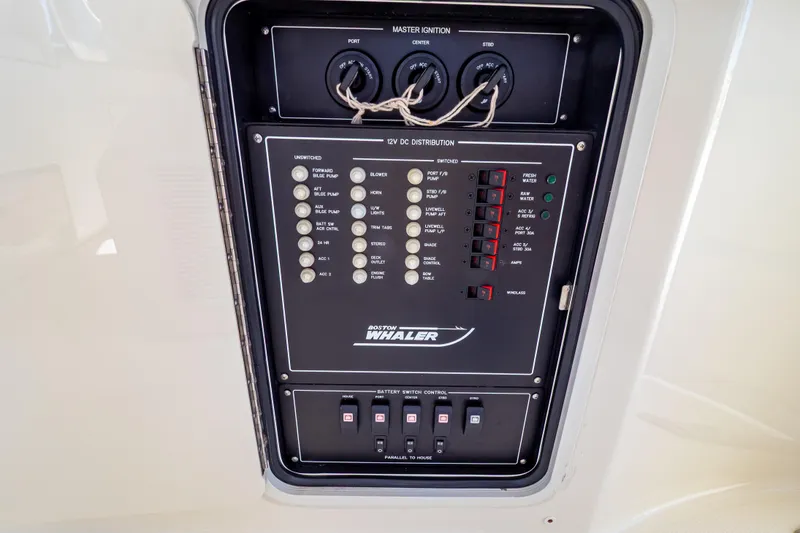 Slide: The Image of Control panel of a 2019 Boston Whaler 350 Realm boat. - 92