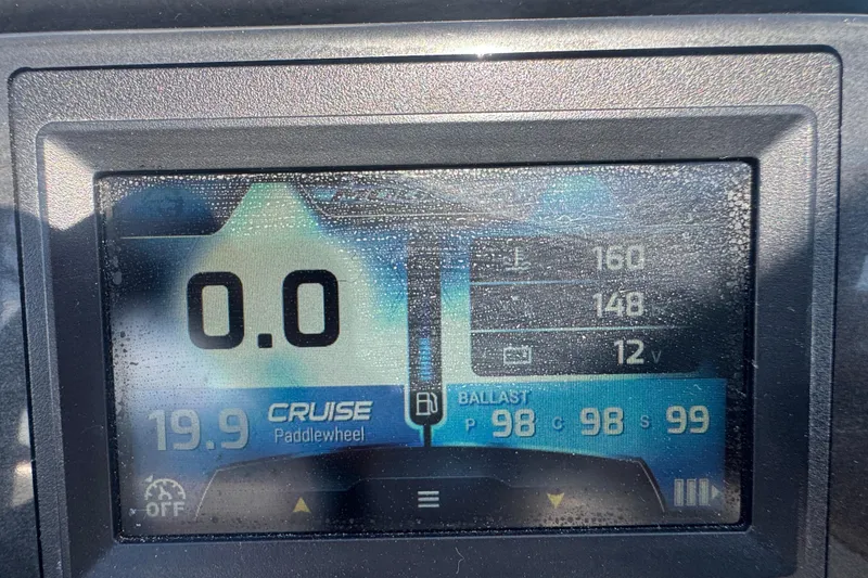 Slide: The Image of Dashboard display of a 2017 Moomba Helix boat showing speed and ballast settings. - 17