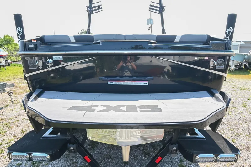 Slide: The Image of 2023 Axis T220 boat rear view with swim platform and wakeboard tower. - 15
