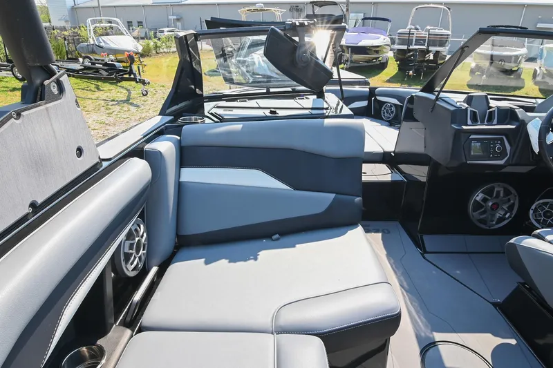 Slide: The Image of 2023 Axis T220 boat interior with modern seating and dashboard design. - 28