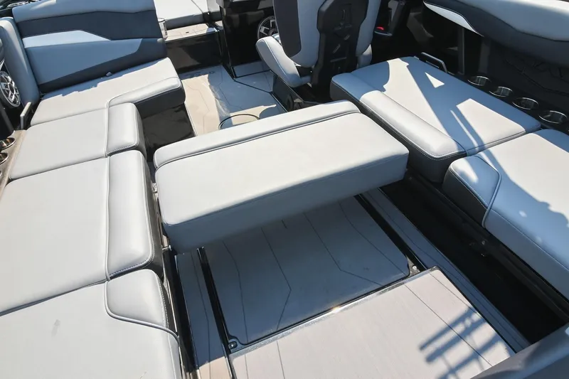 Slide: The Image of 2023 Axis T220 boat interior with spacious seating and modern design. - 29