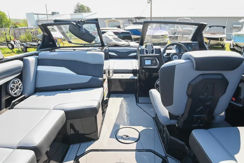 Slide: The Image of 2023 Axis T220 boat interior with modern seating and dashboard design. - 31
