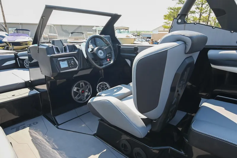 Slide: The Image of 2023 Axis T220 boat interior with modern dashboard and seating. - 32