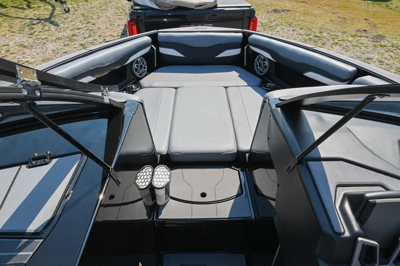 Slide: The Image of 2023 Axis T220 boat interior with gray seating and modern design. - 36