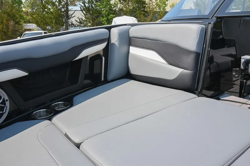 Slide: The Image of 2023 Axis T220 boat interior with sleek gray seating and cup holders. - 42