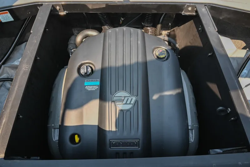 Slide: The Image of 2023 Axis T220 engine compartment featuring Monsoon engine. - 48