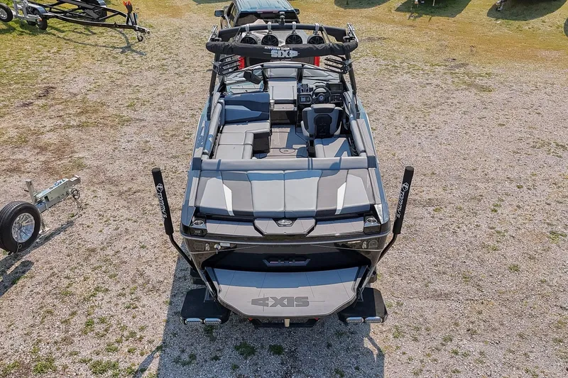 Slide: The Image of 2023 Axis T220 boat, aerial view, showcasing sleek design and spacious interior. - 53