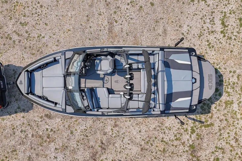 Slide: The Image of Overhead view of 2023 Axis T220 boat on gravel surface. - 9