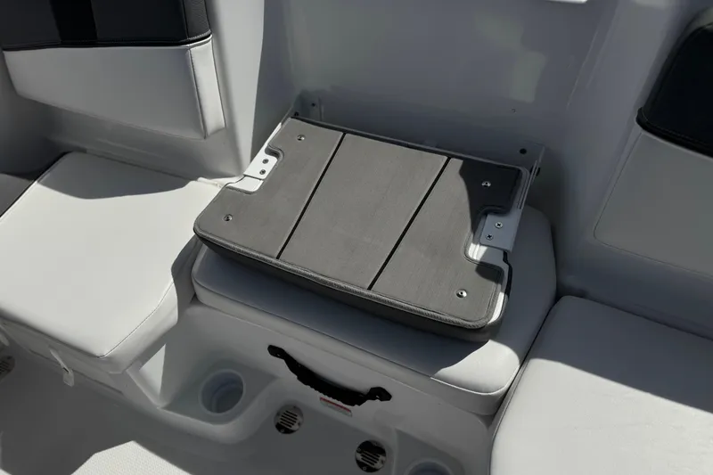 Slide: The Image of 2025 Tahoe T16 boat interior with foldable seat and cup holders. - 19