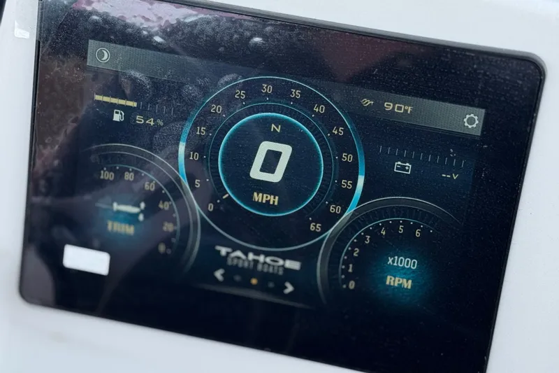 Slide: The Image of Digital dashboard of 2025 Tahoe T16 displaying speed, fuel, and temperature. - 28