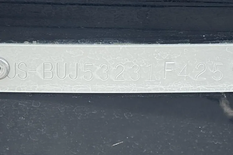 Slide: The Image of VIN plate on a 2025 Tahoe T16 vehicle, displaying identification number. - 34