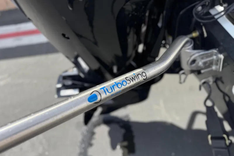 Slide: The Image of Close-up of TurboSwing bar on 2025 Tahoe T16 boat engine. - 8