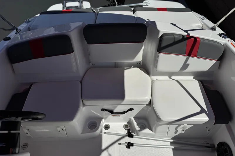 Slide: The Image of 2024 Tahoe T16 boat interior with cushioned seating and modern design. - 17