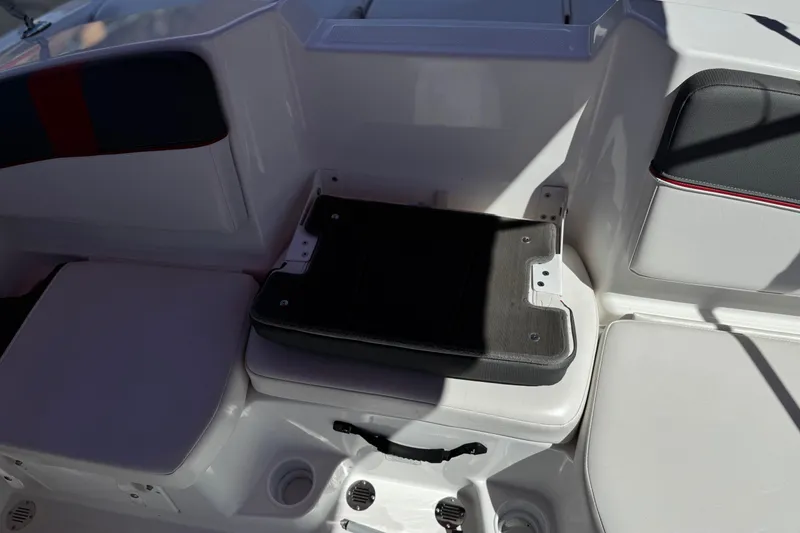 Slide: The Image of 2024 Tahoe T16 boat interior seating with storage compartment. - 18