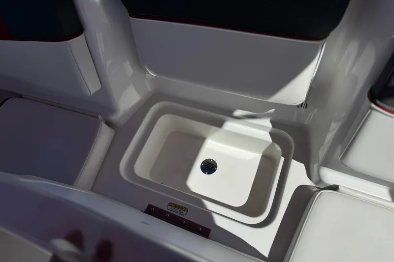 Slide: The Image of 2024 Tahoe T16 boat interior with built-in storage compartment. - 20
