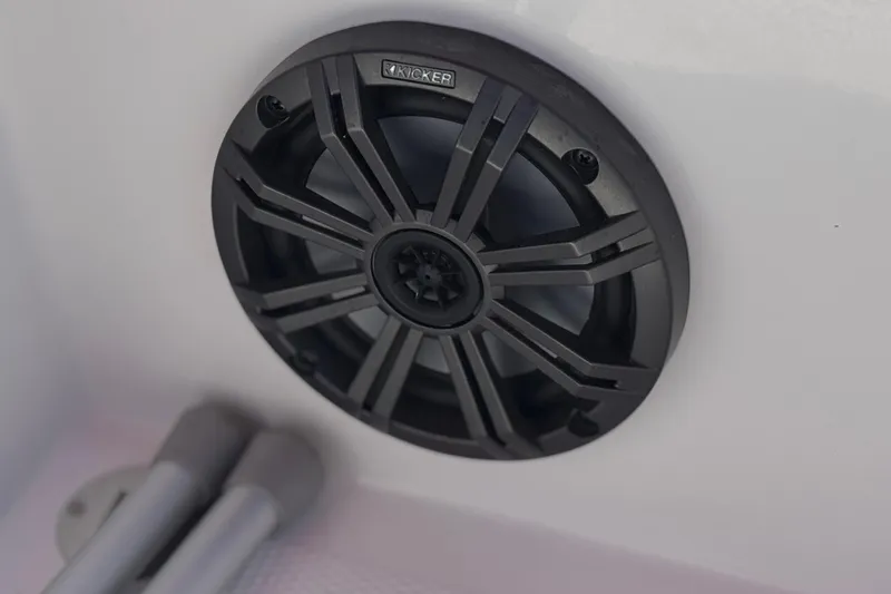 Slide: The Image of 2024 Tahoe T16 speaker detail with Kicker audio system. - 22