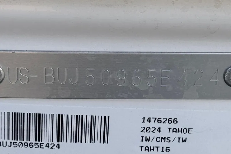 Slide: The Image of 2024 Tahoe T16 identification plate with serial number and barcode. - 32