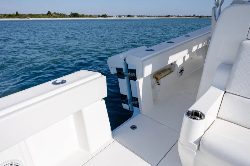 Slide: The Image of 2019 SeaVee 370Z boat interior with open deck and ocean view. - 16