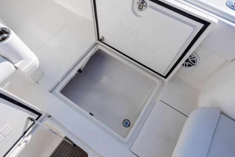Slide: The Image of Open storage compartment on a 2019 SeaVee 370Z boat deck. - 34