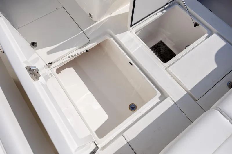 Slide: The Image of 2019 SeaVee 370Z boat storage compartments with open hatches, showcasing spacious interior. - 35