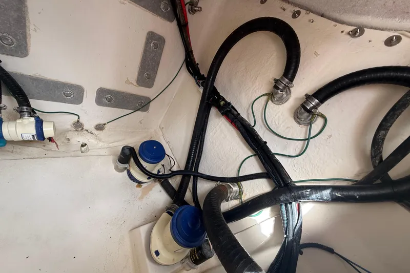 Slide: The Image of 2022 Twin Vee 280 GFX CC boat interior wiring and plumbing system. - 44