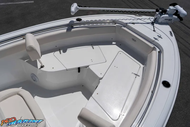 Slide: The Image of 2023 Sea Hunt Ultra 239 SE boat deck with seating and trolling motor. - 32