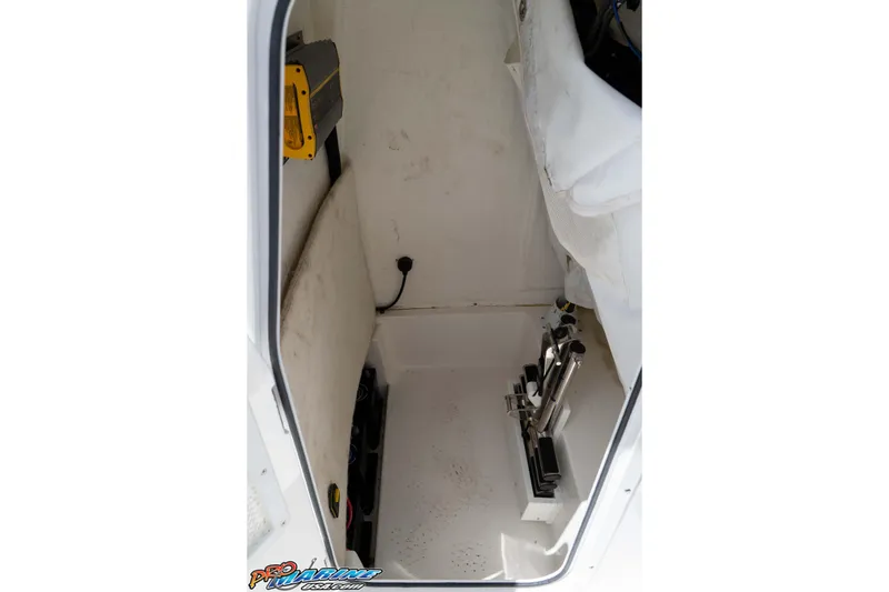 Slide: The Image of Interior view of 2023 Sea Hunt Ultra 239 SE boat compartment. - 35