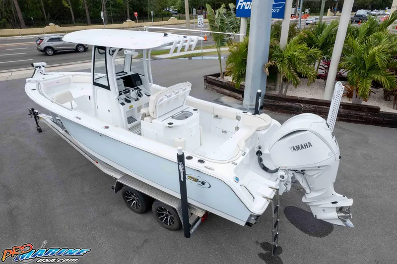 Slide: The Image of 2023 Sea Hunt Ultra 239 SE boat with Yamaha engine on trailer. - 41