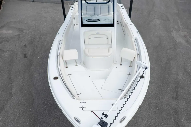 Slide: The Image of 2023 Sea Hunt Ultra 239 SE boat, top view of spacious deck and seating area. - 49