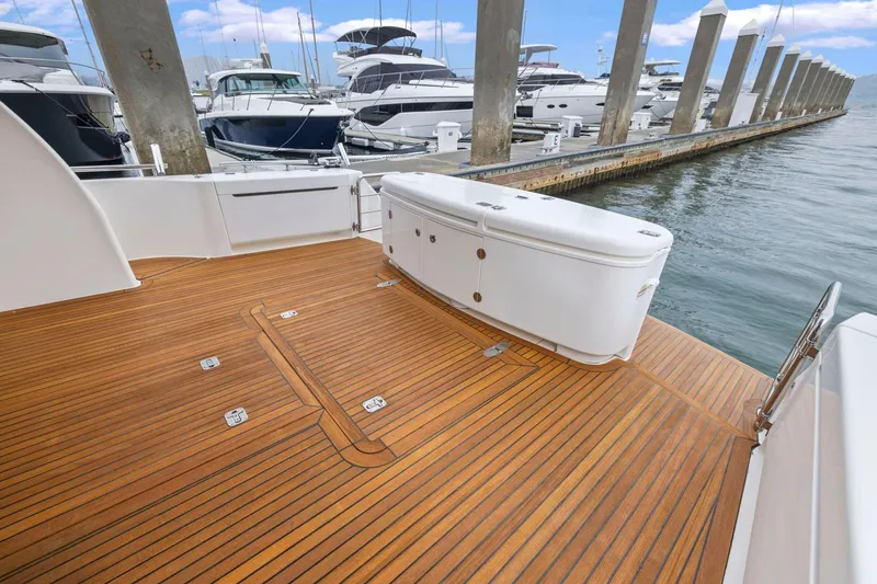 Slide: The Image of Luxurious 2014 Maritimo M50 yacht with elegant teak deck at marina. - 23