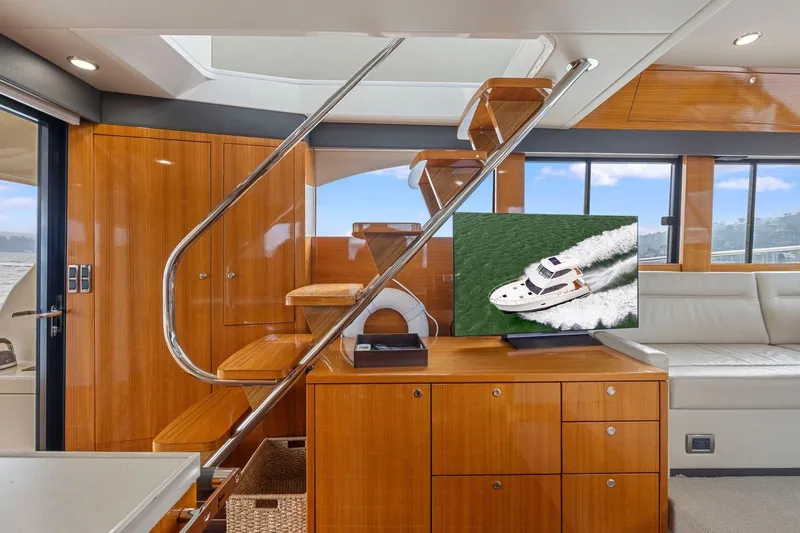 Slide: The Image of Luxurious 2014 Maritimo M50 yacht interior with sleek wooden finishes and modern design. - 35