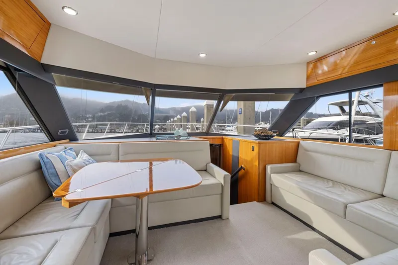Slide: The Image of Luxurious interior of 2014 Maritimo M50 yacht with panoramic windows and elegant seating area. - 39