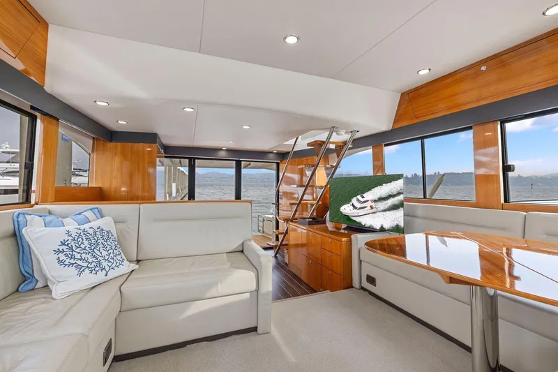 Slide: The Image of Luxurious interior of 2014 Maritimo M50 yacht with elegant wood finishes and comfortable seating. - 40