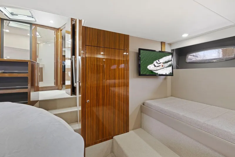 Slide: The Image of Luxurious interior of 2014 Maritimo M50 yacht with wood paneling and TV. - 61