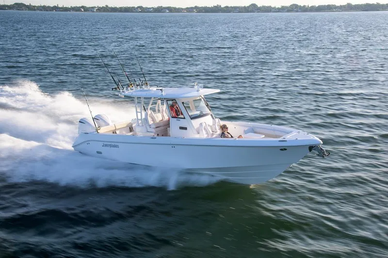 The Image of 2026 Everglades 335 Center Console boat cruising on open water. - 0