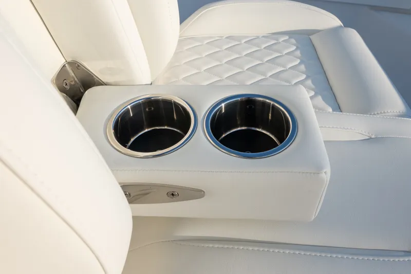 Slide: The Image of Luxurious white seating with cup holders on 2026 Everglades 335 Center Console boat. - 25