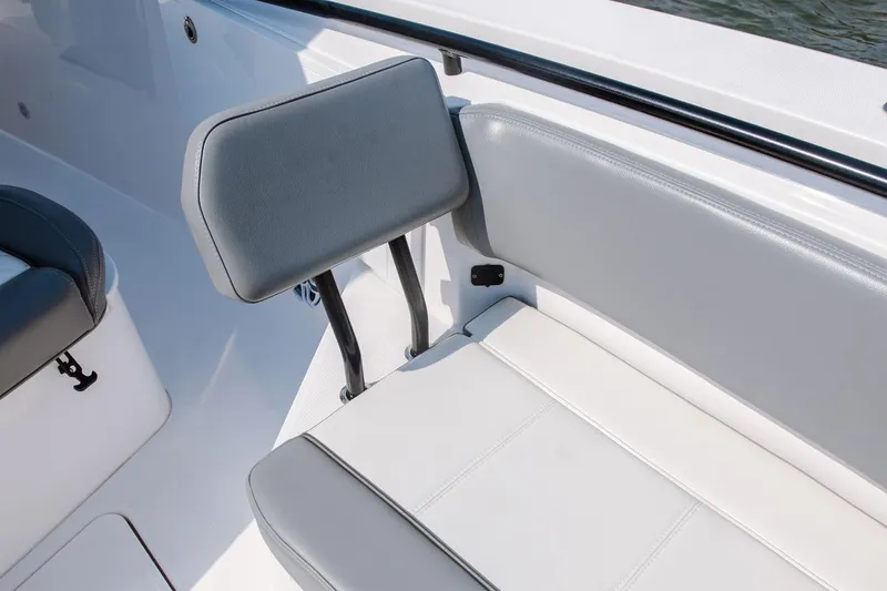 Slide: The Image of 2026 Everglades 335 Center Console boat seating, featuring sleek gray and white upholstery. - 14