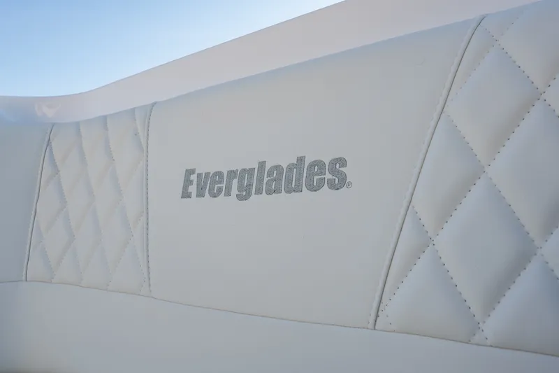 Slide: The Image of Luxury white leather seating on 2026 Everglades 335 Center Console boat. - 26
