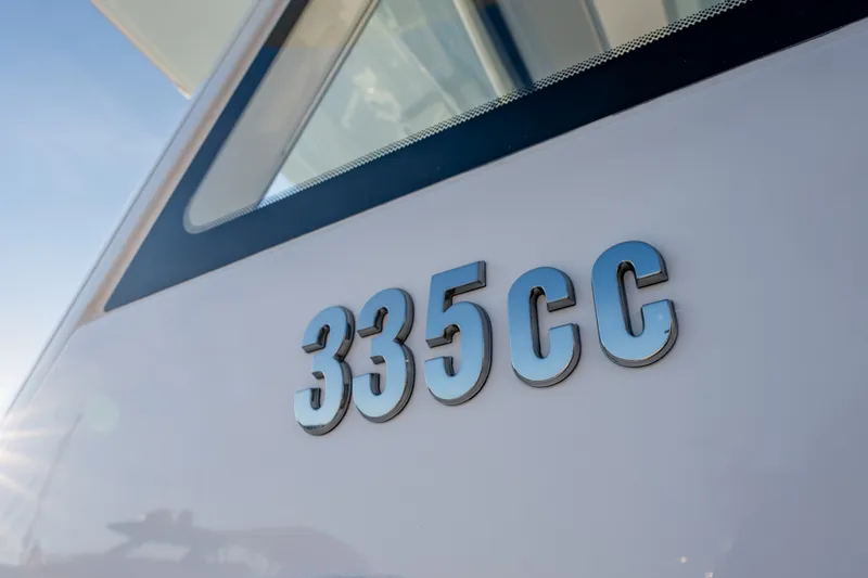 Slide: The Image of 2026 Everglades 335 Center Console boat with sleek design and modern features. - 24