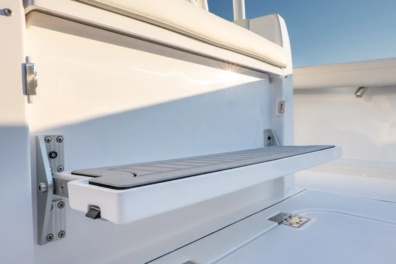 Slide: The Image of 2026 Everglades 335 Center Console boat seat detail, showcasing sleek design and functionality. - 20