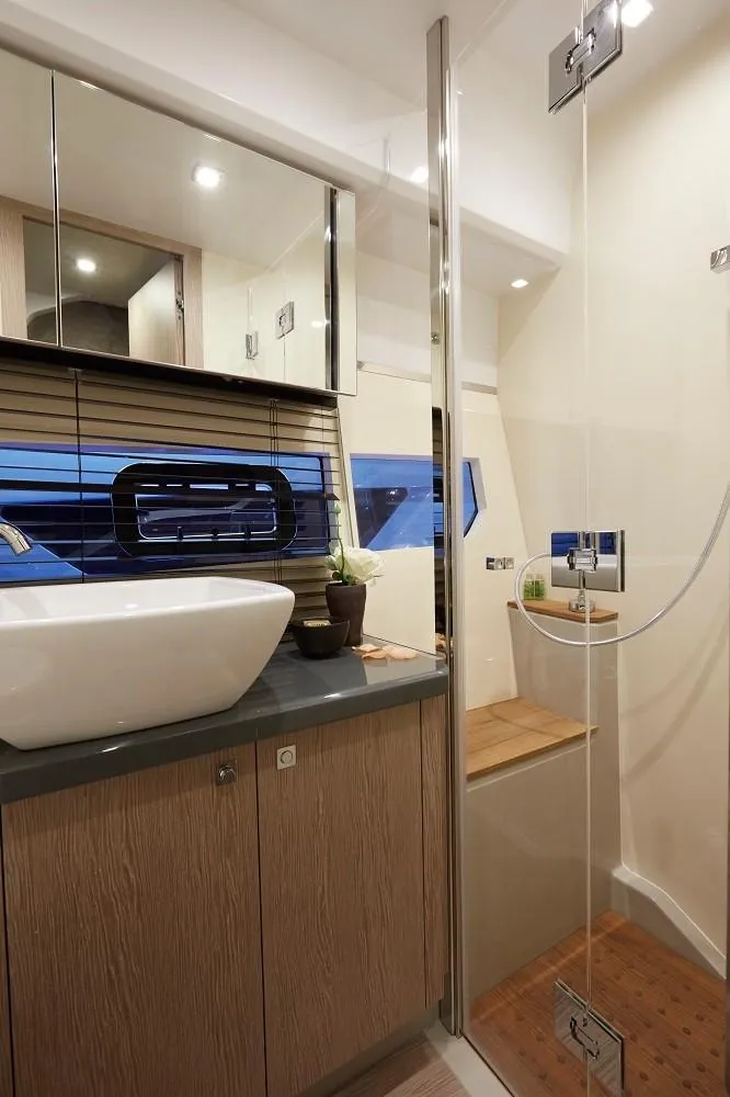 Slide: The Image of Luxurious interior of 2024 Sessa Marine C44 Cruiser with elegant seating and ambient lighting. - 12