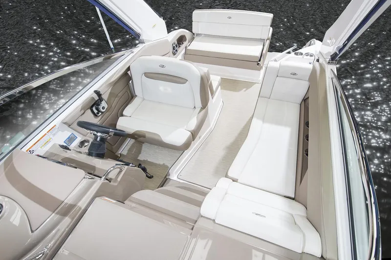 Slide: The Image of Manufacturer Provided Image: 2018 Regal 28 Express boat interior with white and beige seating. - 11