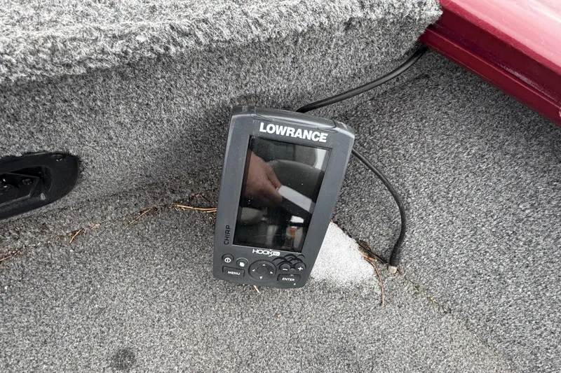 Slide: The Image of Lowrance fish finder on 2018 Tracker Pro Guide V-175 Combo boat carpet. - 12