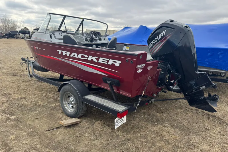 Slide: The Image of 2018 Tracker Pro Guide V-175 Combo boat with Mercury outboard motor on trailer. - 3