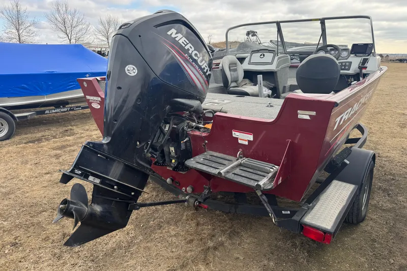 Slide: The Image of 2018 Tracker Pro Guide V-175 Combo boat with Mercury outboard motor on trailer. - 4