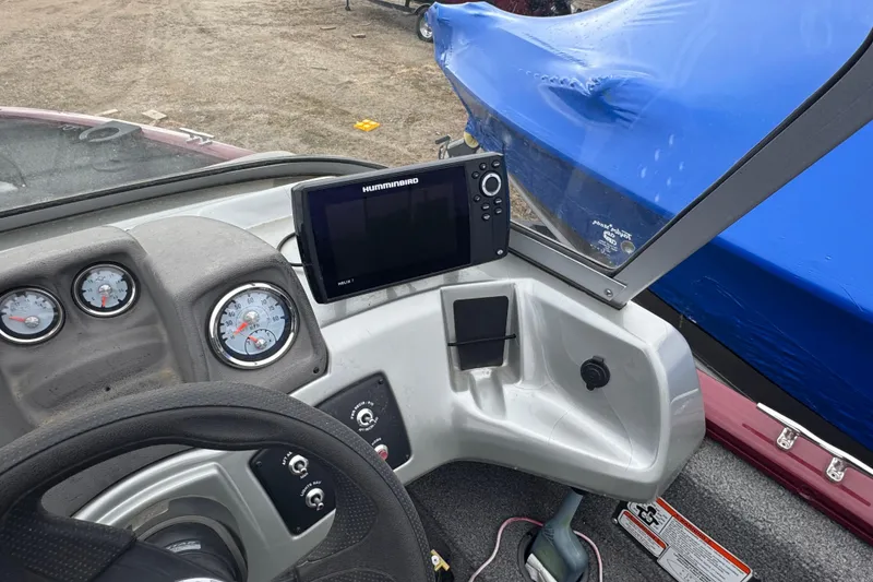 Slide: The Image of 2018 Tracker Pro Guide V-175 Combo dashboard with gauges and Humminbird fish finder. - 9